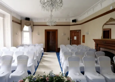 Room decorated for a wedding, ready to receive guests